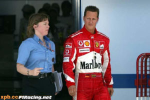 Accompanying Michael Schumacher after Qualifying in Bahrain to the official FIA press conference.